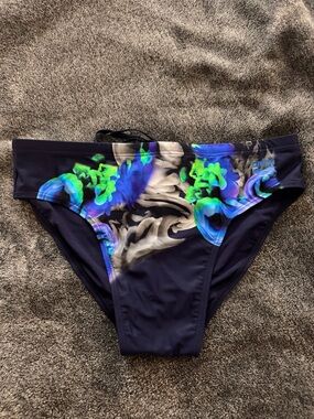 Arena Men's Swim Brief with Neon Blue & Green Smoke Print
